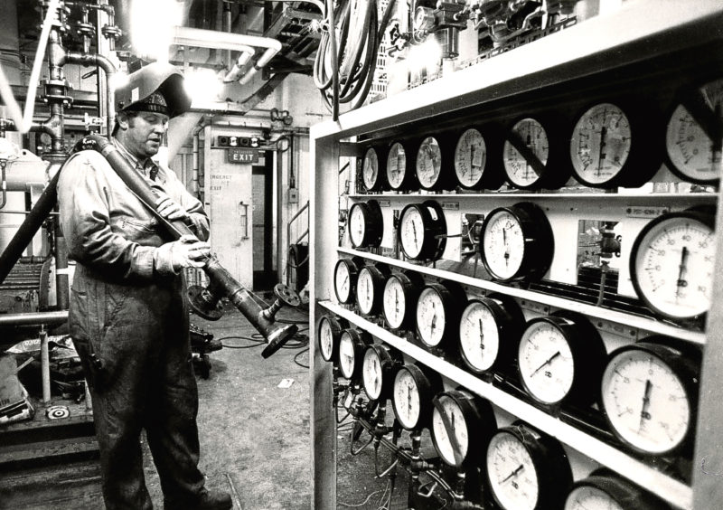 1982: Mr S Rennick of Blandford Offshore fits pipes in the gas compression room.