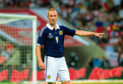 Kenny Miller in action for Scotland.