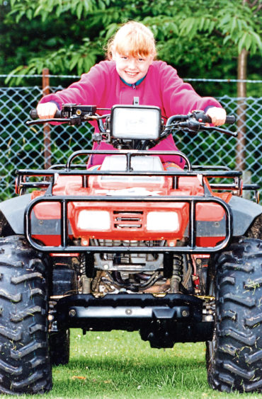 Sarah Rennie from Aberdeen gets to grips with a Honda 350 4 x 4 at Banchory Show