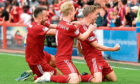 Aberdeen's Bruce Anderson, right, celebrates his late equaliser against Rangers in 2018.
