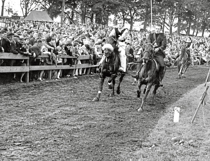 Rounding the corner in the handicap trot during the afternoon programme