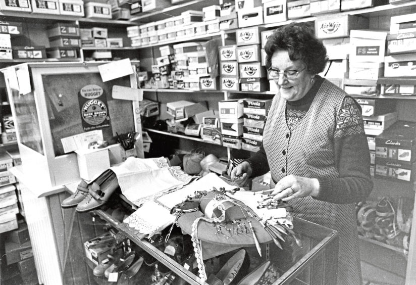 1980: Ethel Begg lace-making during slack moments in her shoe shop