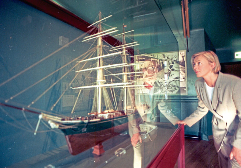 1997: A visitor studies one of the models at the Aberdeen Maritime Museum in 1997