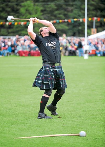 2009: A competitor warms up before hurling his main throw