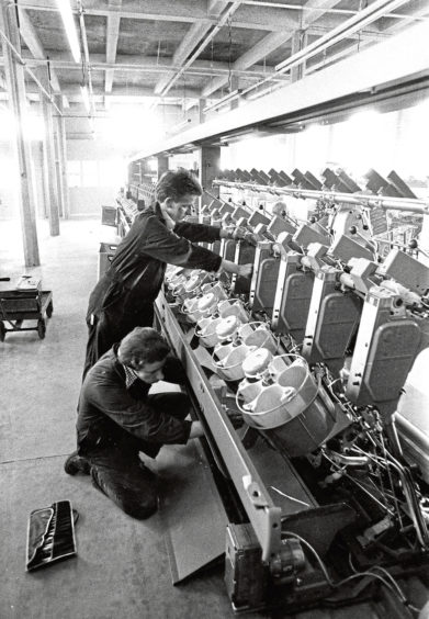1980: Engineer George Duncan, left, and apprentice Stephen Main at work on a new machine
