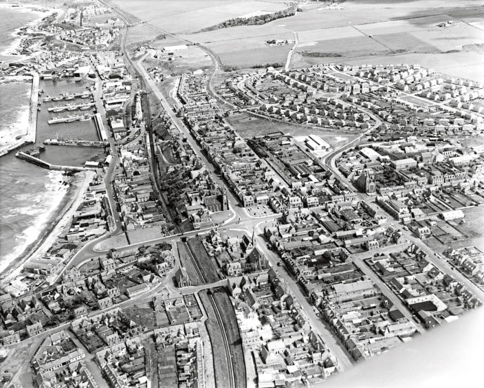 1971: An aerial view of the harbour and surrounding areas