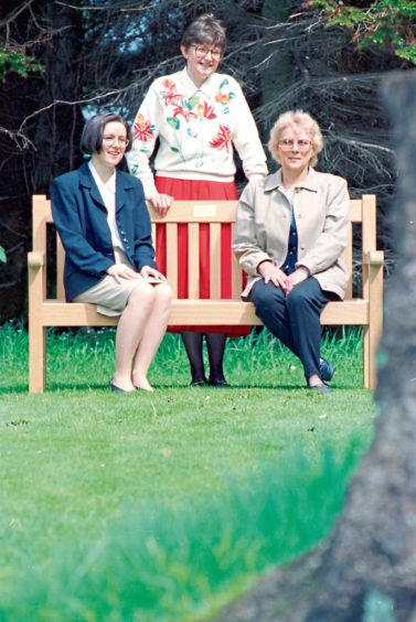 1996: From left, Kay Smart, Dr Margaret Denholm from Roxburghe and Agnes Flett at a bench in memory of Joe Smart