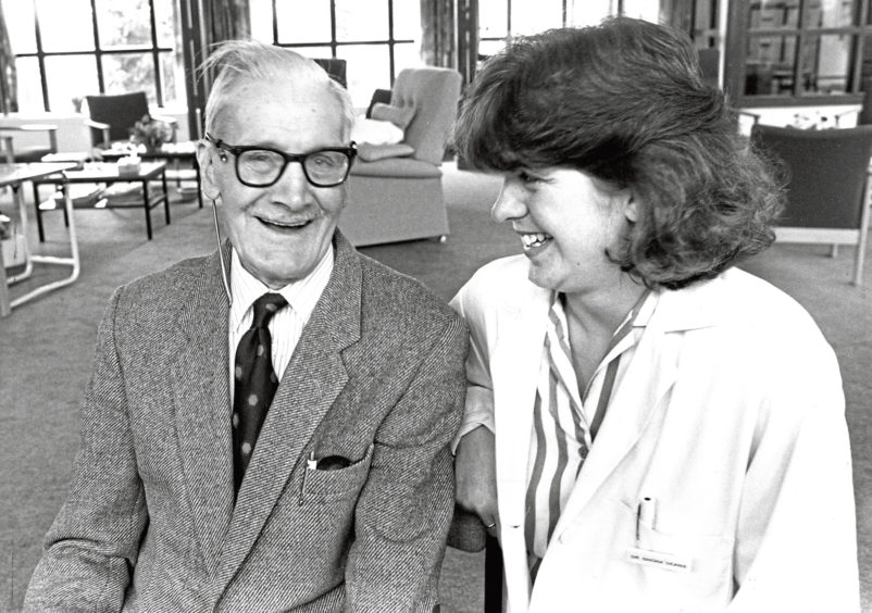 1990: Sharing a joke can be just what the doctor ordered... patient Bill Deackins with Dr Shona Deans at Roxburghe House