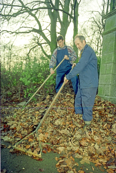 1994: Workers sweep up the autumn leaves at Duthie Park in November 1994