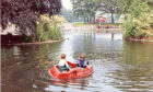 1990: Two boys out on a pedalo on the boating pond in Duthie Park
