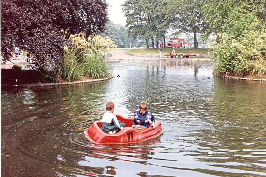 1990: Two boys out on a pedalo on the boating pond in Duthie Park