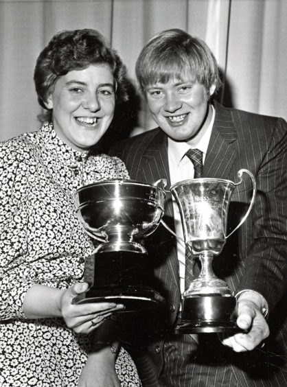 1983: Best boy and best girl Peter Bruce and Moira MacDonald show their silverware from the annual prizegiving