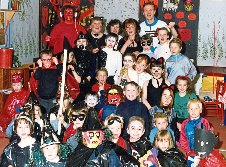 1990: Alex McLeish judges the costumes at a party at Primrosehill Family Centre