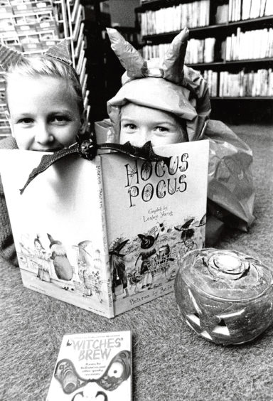 1988: Dale Shearer and Emma Morrison, both  from Linksfield, enjoy spooky stories at Linksfield Library’s Halloween Happening