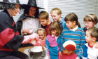1991: Marion Wands, left, and Gabrielle Shields concoct a brew for a group of enchanted children at Bucksburn Library to enjoy