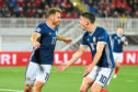 Scotland's Ryan Fraser (L) celebrates his goal with Ryan Christie.