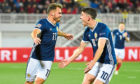 Scotland's Ryan Fraser (L) celebrates his goal with Ryan Christie.