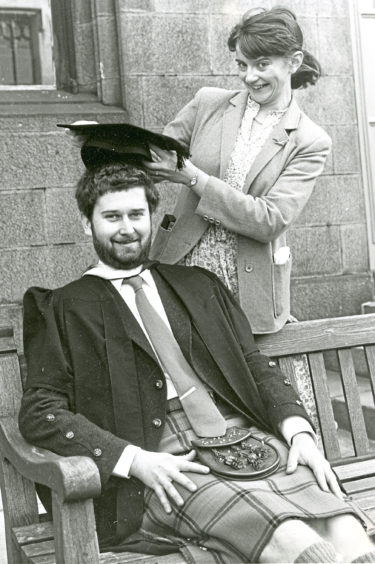 1981: Alison Laing crowns her graduate fiance Donald Omand at the Mitchell Hall