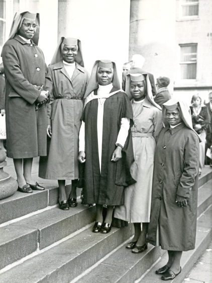 1975: Sister Camillus, centre, with her fellow Nigerian nuns after she received her Certificate of Health Visiting