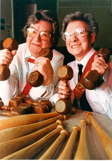 1992: Myra McDonald, left, and Isabel Davidson of the 19th Company Girls Brigade get to grips with some equipment which was around in their younger days