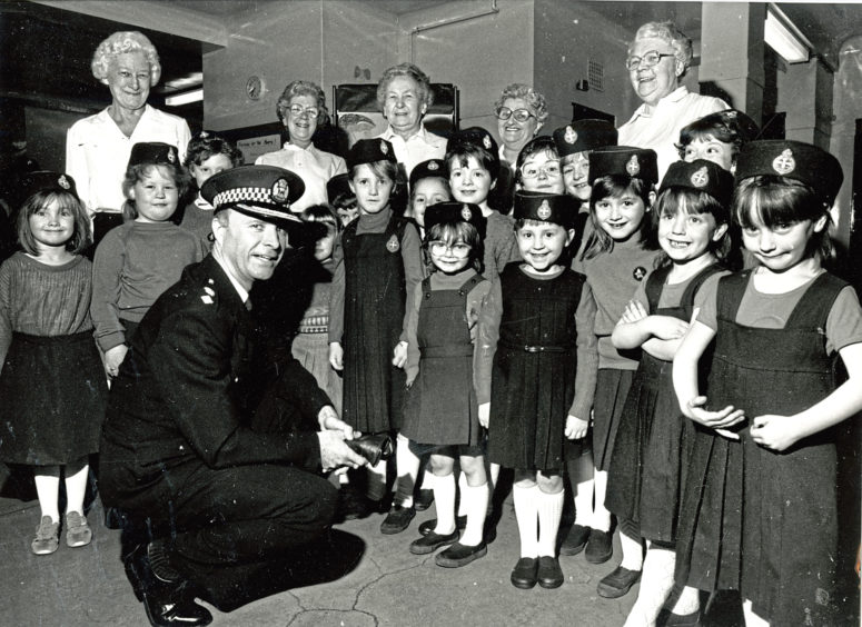 1988: Inspecting the 24th Aberdeen Company Girls’ Brigade at their 60th anniversary display in Tullos School Hall is Chief Supt David Beattie