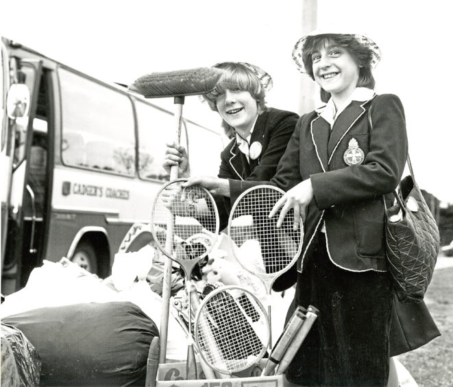 1982: 1st Ellon member Moira Robertson, left, and Pamela Wyness, 9th Aberdeen, make sure the sports gear is safe as they get ready to pack their coach