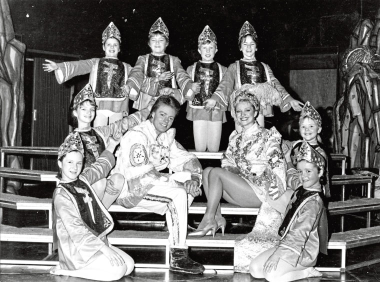 1984: Stars of Aladdin Edwina Laurie and Allan Stewart are surrounded by members of the Jessiman School of Dancing