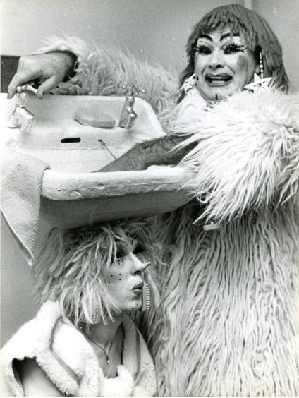 1983: The flamboyant ugly sisters’ costumes even include a sink – and the pair were hoping to make a splash at HMT