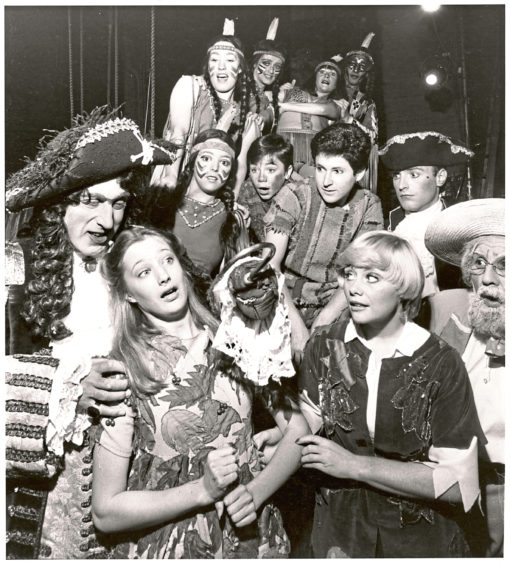1979: Rikki Fulton as nasty old Captain Hook struggles with Wendy, played by Nikki Wright, and Anne Aston as Peter Pan