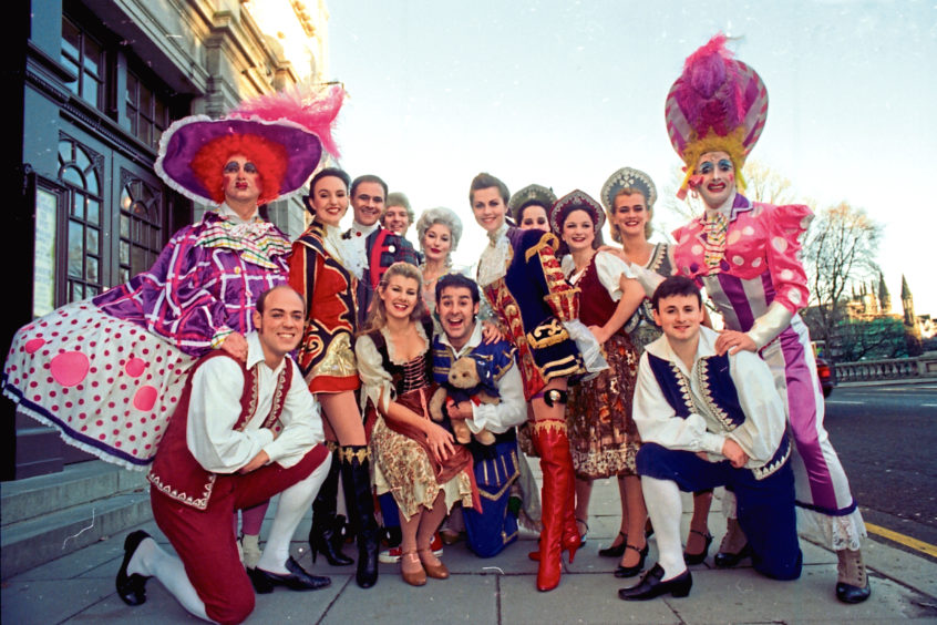 1996: The cast of Cinderella at His Majesty’s Theatre are ready for their close up