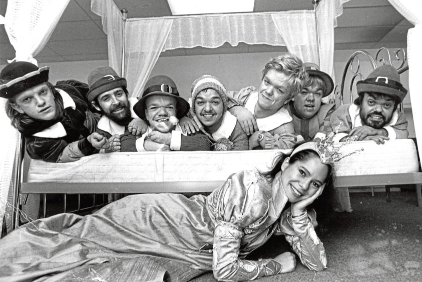 1986: There’s no room in this bed for Snow White while on a tour of the Royal Workshops for the Blind in Tullos