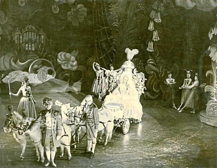 1955: Cinderella makes a dramatic arrival at the ball with her coach and horses at His Majesty’s Theatre