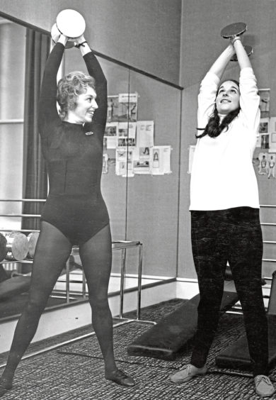 1992: Gunilla Smith applies pressure to the two new male keep-fit leaders in the Scottish-Swedish Association, Jim Hunter, left, and John Boyle, watched by the new female leaders
