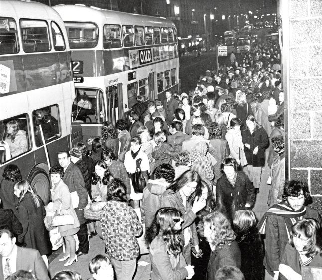 1971: Shoppers pack Aberdeen city centre on the last Saturday before Christmas in this picture taken in Union Street opposite Back Wynd