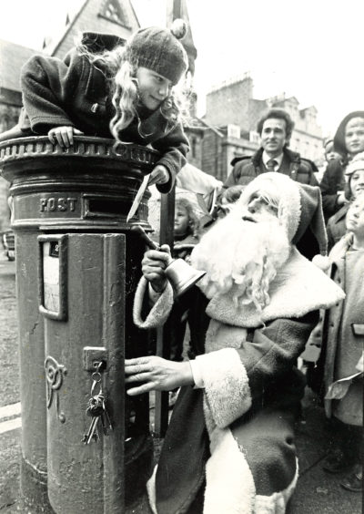 1984: Just making the first post for letters to Santa is Kirsty Younie of Aberdeen Waldorf School