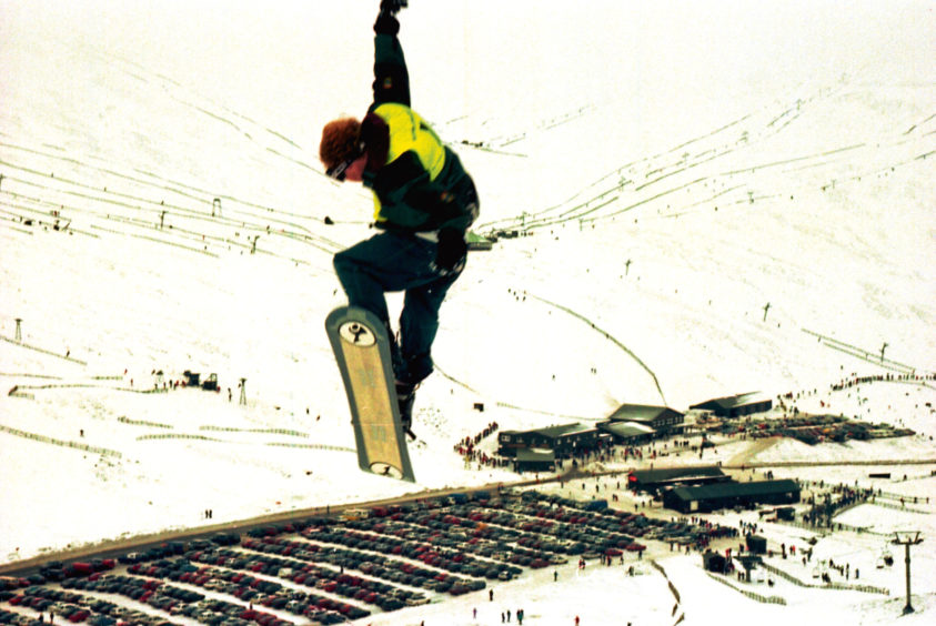 1996: A boarder shows some top moves during the Air and Style competition