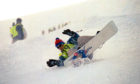 1995: Action from the first British Open Snowboarding Championships on Glenshee