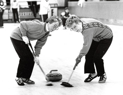 1990: Skip Betty Donald’s sweepers hard at work during their opening game at Stoneywood