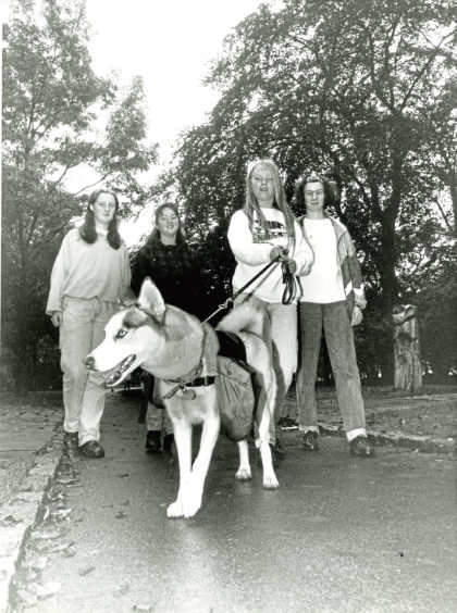 1992: Taking the lead on a sponsored walk were, from left, Sandra Middleton, Katie Keith, Claire Mullinger and Pauline Burr with husky Natasha