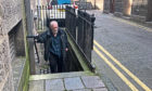 Andrew Webster, 64, leaves court where he pled guilty to two drink-driving offences within the last year