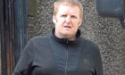 Rogue trader Stuart Burns leaves court after being found guilty of scamming a woman out of £45,000