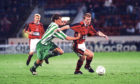 Duncan Shearer, right, in action for the Dons against Zalgiris Vilinius in 1996.