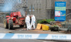 Police at the scene of the botched ATM theft in Torphins – one of the raiders is appealing to have his sentence cut
