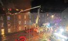 Firefighters tackle the blaze, described as a ‘major incident’, which was started by Stefan Kubina