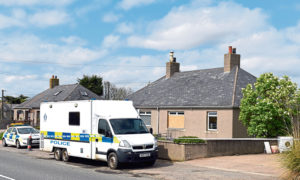 Police Scotland at the home of Brian McKandie, Fairview Cottages, Badenscoth, Aberdeenshire.