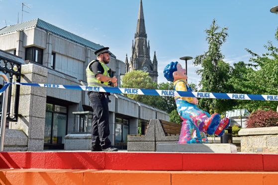 Police taped off the rooftop area of the Bon Accord Centre in Aberdeen during an investigation into the incident