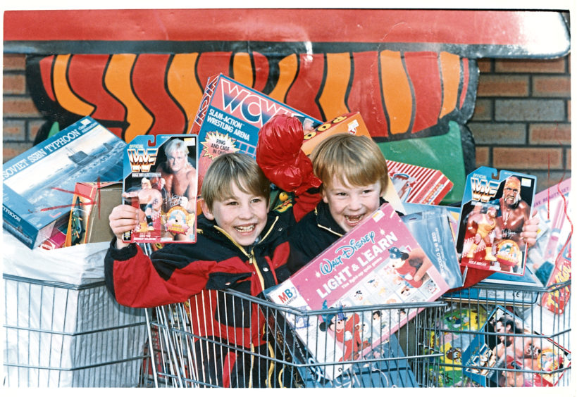 The Boyd brothers, eight-year-old Stephen and six-year-old Mark, check out toys to be gifted to children less fortunate than themselves in Grampian TV’s annual toy appeal