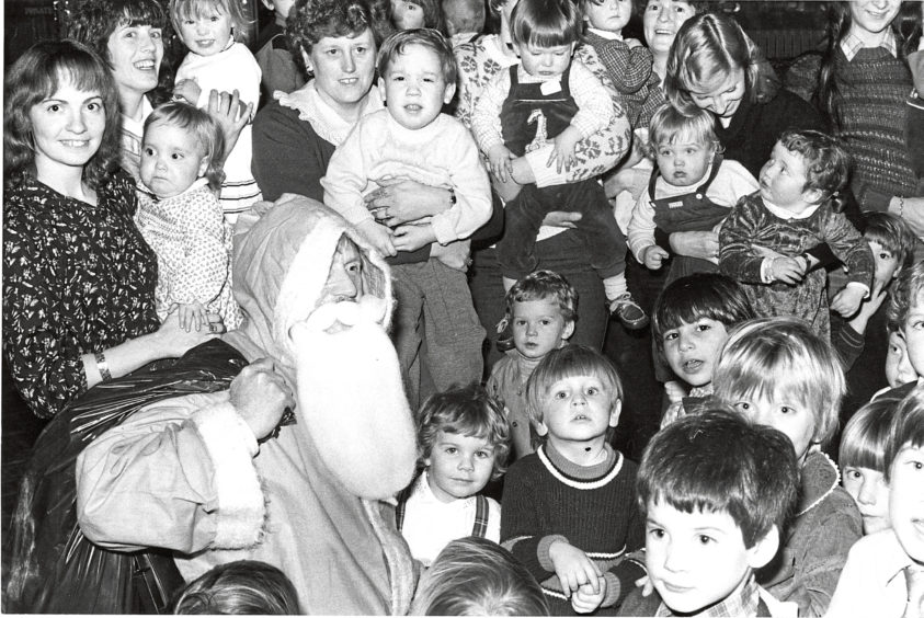 1982: Santa spreads Christmas cheer among youngsters at the Aberdeen University’s children’s Christmas party