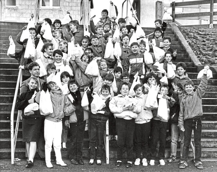 1987: Christmas food parcels were delivered to pensioners living in the Linksfield Academy area by some of the school’s first year pupils. The delivery operation was organised by assistant head teacher Peter Keith, front left