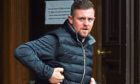 Scott Banks has been banned from driving for nearly two years and ordered to carry out unpaid work